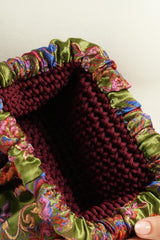 Pochette en brocart mauve