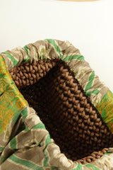 Pochette en brocart vert et argenté