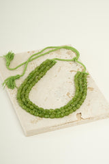 Sautoir triple-rangs en perles "Vert pistache"